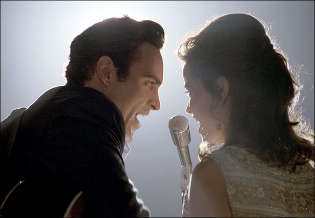 Joaquin Phoenix and Reese Witherspoon as Johnny Cash and June Carter Cash in Walk the Line (2005).